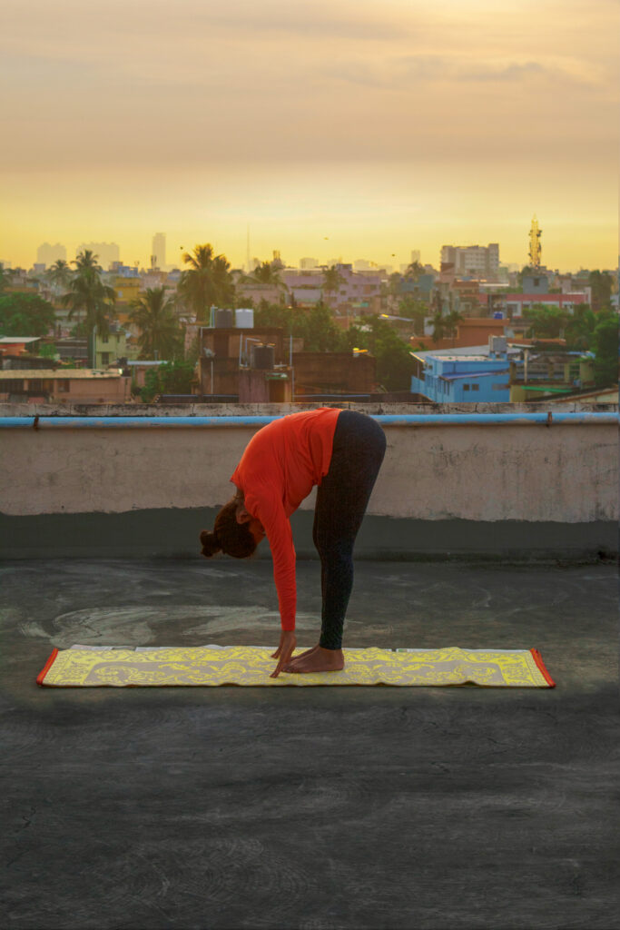  Pada Hastasana पादहस्तासन (Hand-to-foot Pose)  "asana three in Surya Namaskar"